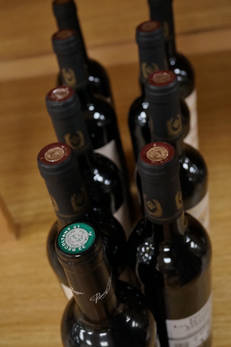 Eight bottles of Chateau Les Grands 2024, and a bottle of Bordeaux 2022